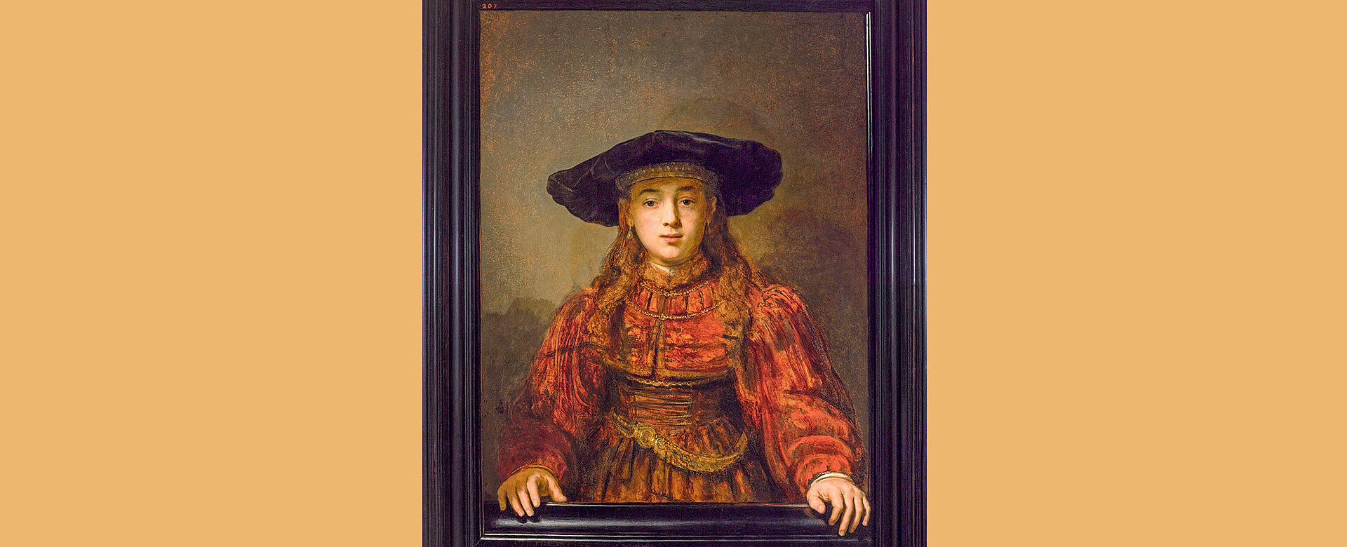 "Mädchen in einem Bilderrahmen“ von Rembrandt